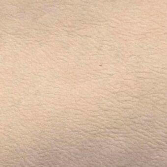 Rugiano leather rug, smooth nabuk beige texture, consistent light tone, subtly pebbled surface, studio shot, neutral background.